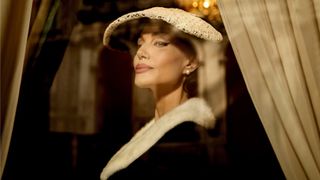 Maria Callas (Angelina Jolie) looks out a window as seen in Netflix's "Maria"