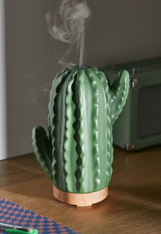 cactus-shaped diffuser with steam coming out of the top