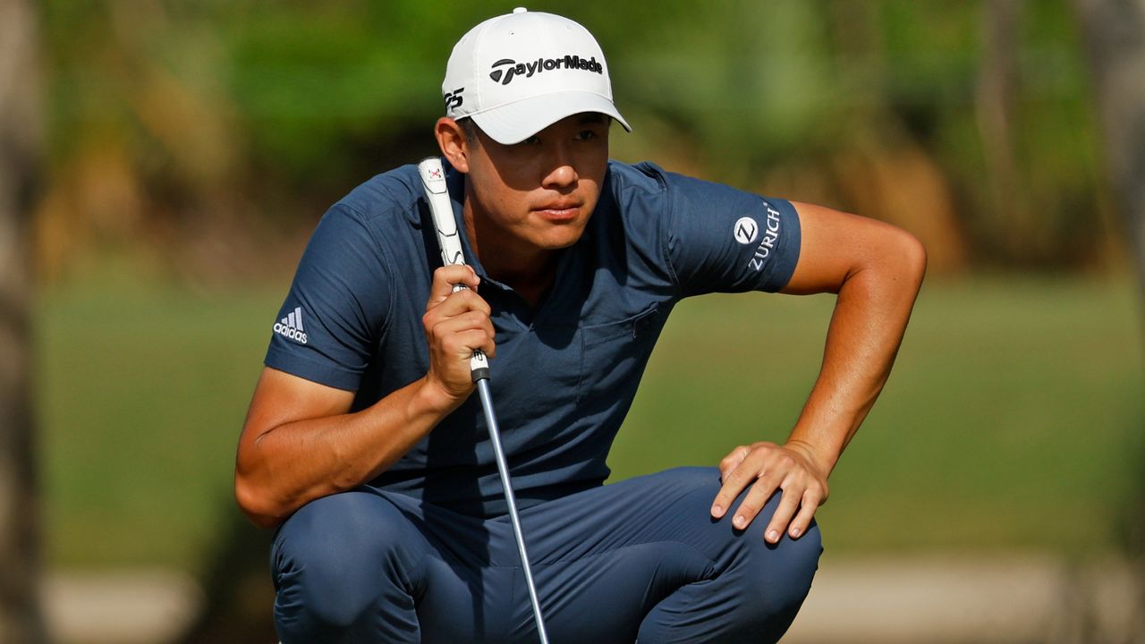 Collin Morikawa lines up a putt at the 2022 Zurich Classic of New Orleans