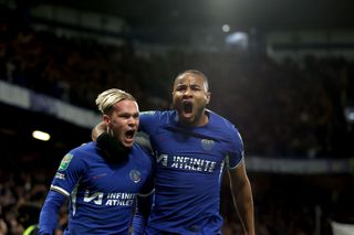 Mykhailo Mudryk of Chelsea celebrates scoring their equilizer with Christopher Nkunku of Chelsea during the Carabao Cup Quarter Final match between Chelsea and Newcastle United at Stamford Bridge on December 19, 2023 in London, England. (Photo by Chris Lee - Chelsea FC/Chelsea FC via Getty Images)