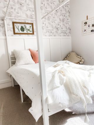 neutral girls room with grey wallpaper
