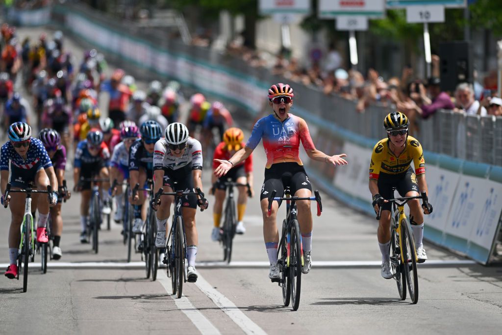 OLBIA ITALY JULY 09 Chiara Consonni of Italy and UAE Team ADQ celebrates at finish line as stage winner ahead of LR Ally Wollaston of New Zealand and Team AG Insurance Soudal QuickStep and Marianne Vos of The Netherlands and Team JumboVisma during the 34th Giro dItalia Donne 2023 Stage 9 a 12685km stage from Sassari to Olbia UCIWWT on July 09 2023 in Olbia Italy Photo by Dario BelingheriGetty Images