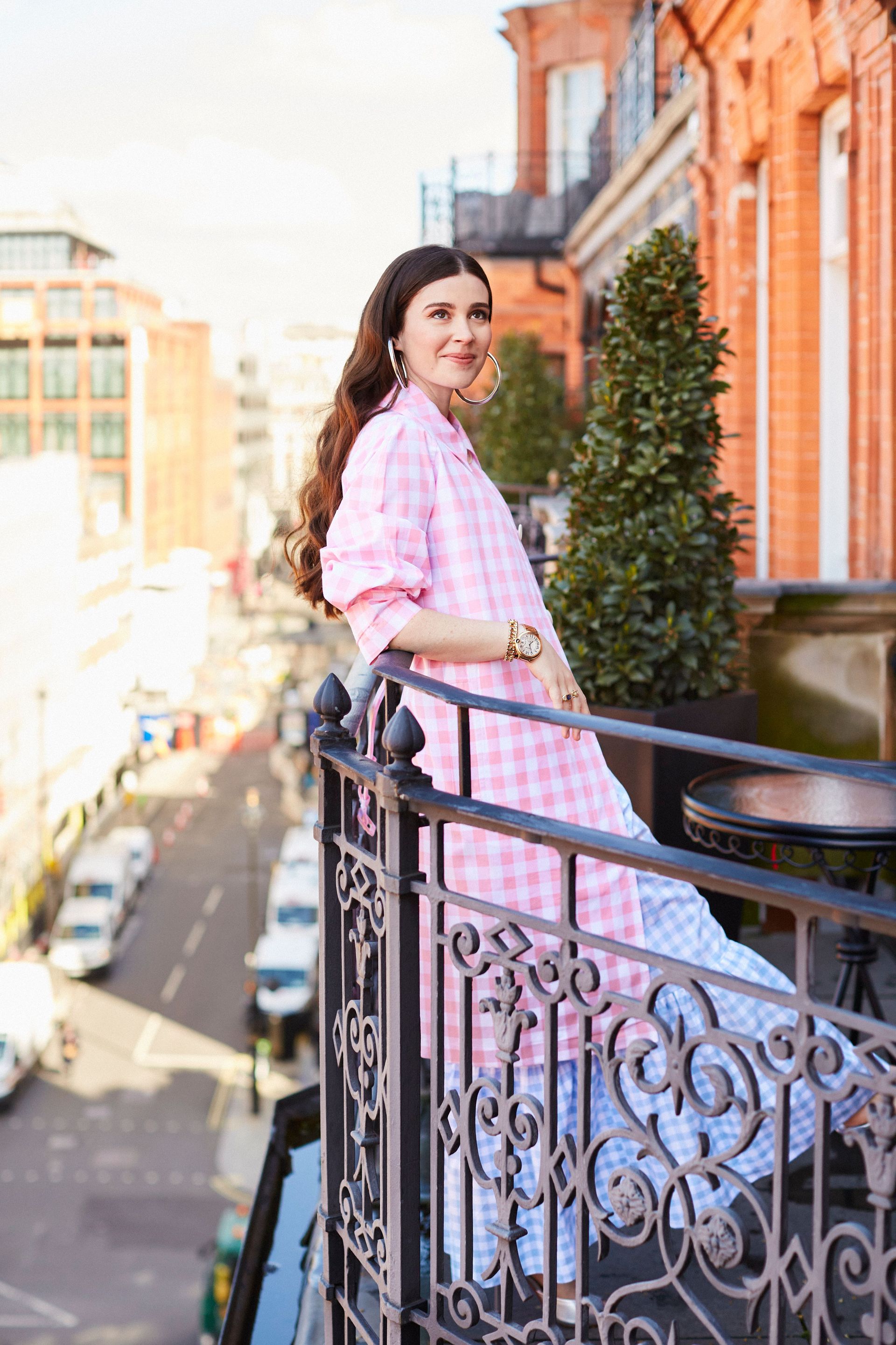 Nell Diamond in a floral dress from the Hill House Home Collection