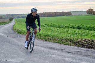 Scott Addict RC being ridden with green field in background