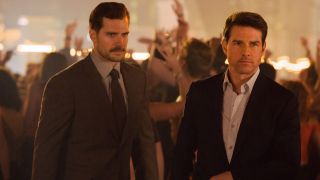 Henry Cavill and Tom Cruise standing in a club in Mission: Impossible - Fallout.
