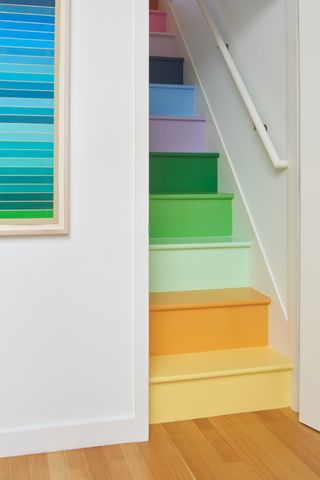 a rainbow painted staircase