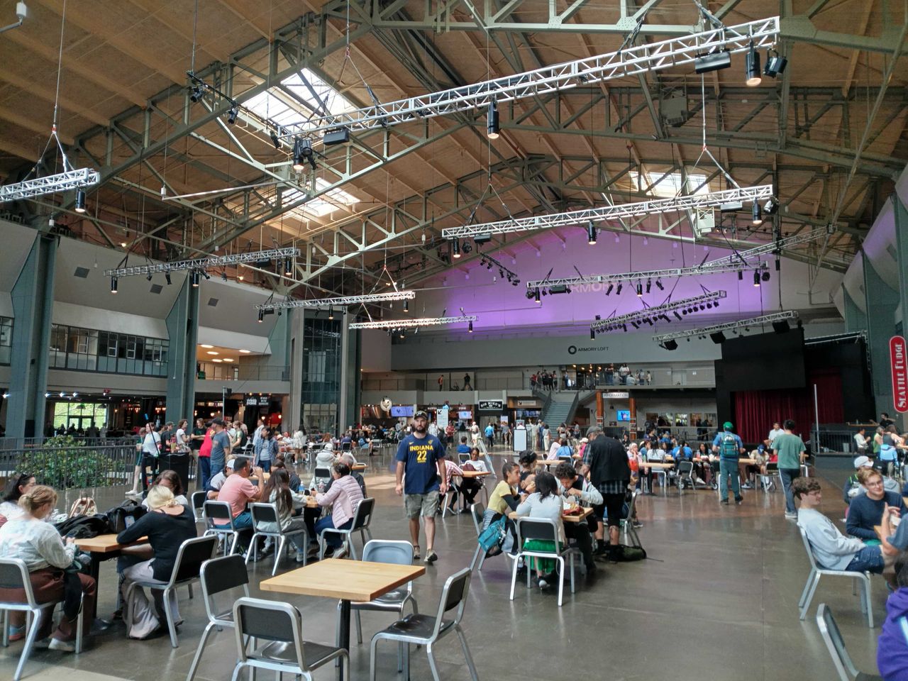 Inside a building with a lot of people