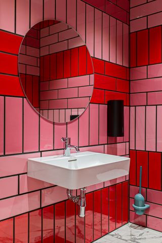 A pink and red bathroom
