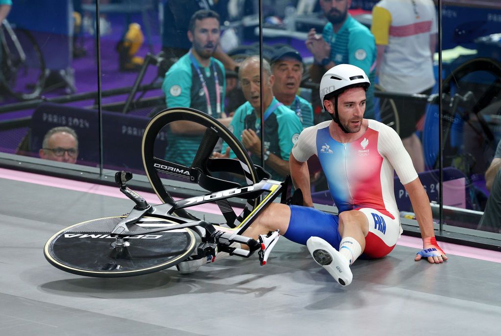 PARIS FRANCE AUGUST 08 Benjamin Thomas of Team France crashes during the Mens Omnium Points Race 44 on day thirteen of the Olympic Games Paris 2024 at SaintQuentinenYvelines Velodrome on August 08 2024 in Paris France Photo by Jared C TiltonGetty Images