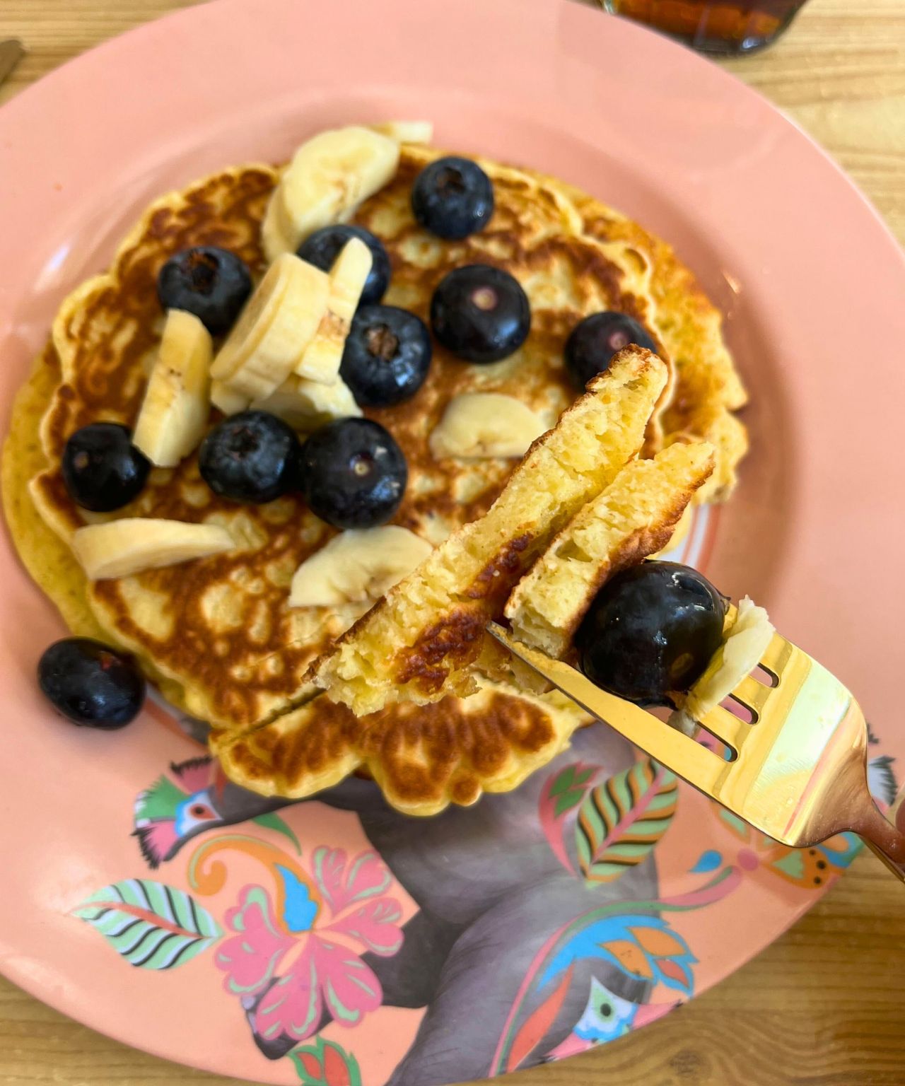 Stove top pancake with section on fork which shows thicker and fluffier texture