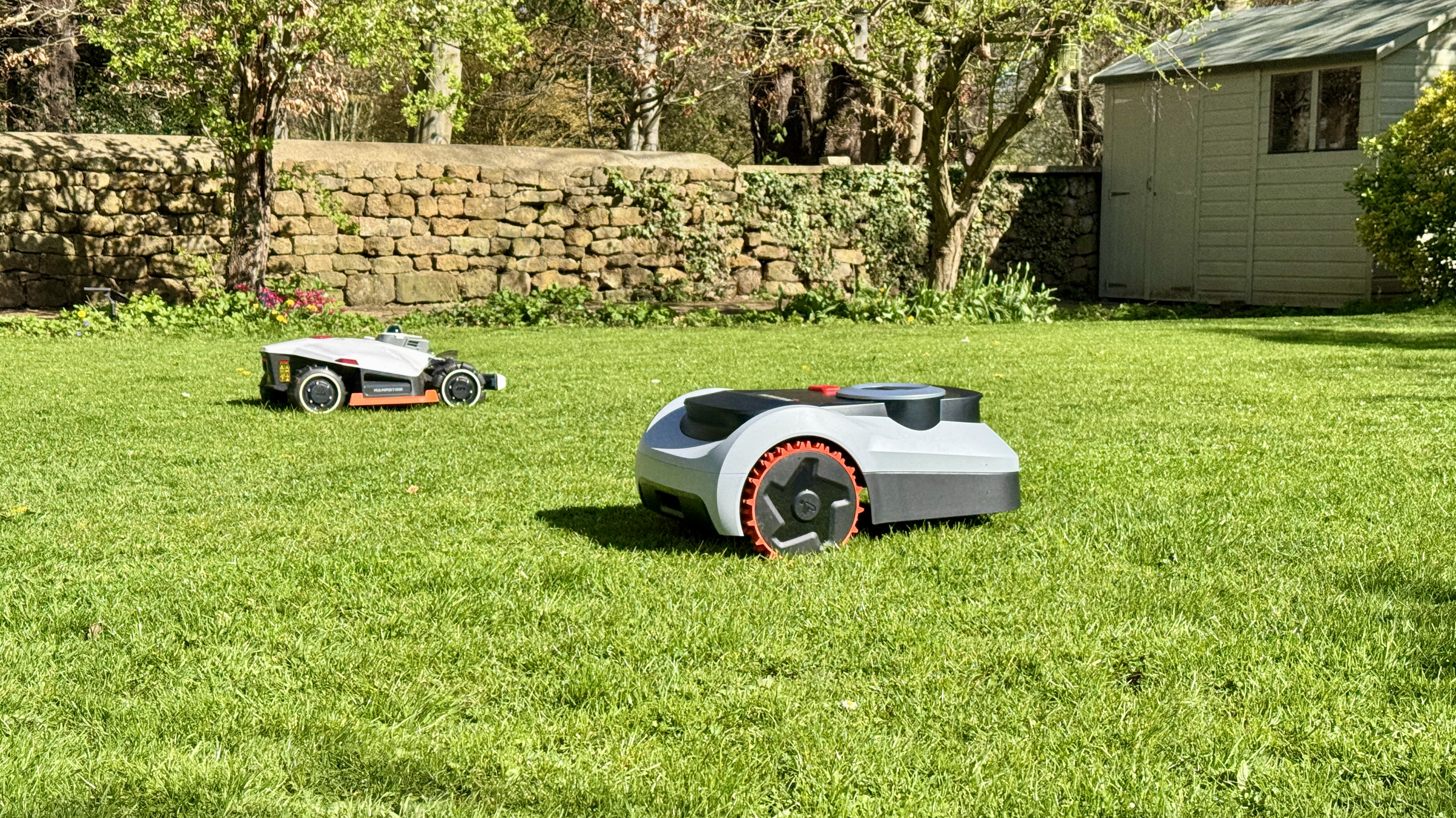 Segway Navimow i210E LiDAR Pro and LUBA 3 on lawn