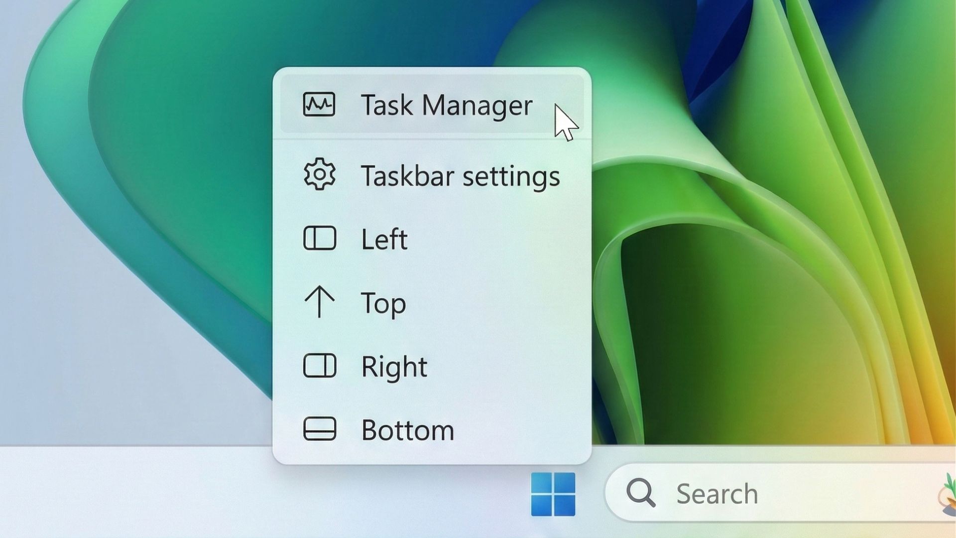 Windows 11 taskbar with reposition options