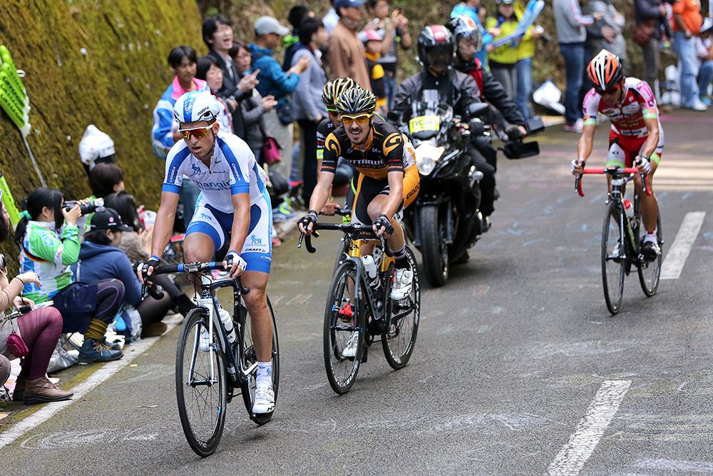 The breakaway riders struggle on
