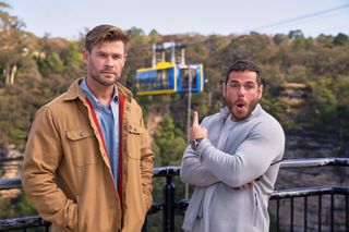Chris Hemsworth and sports scientist Ross Edgley in front of Chris' challenge — an extreme rope climb.