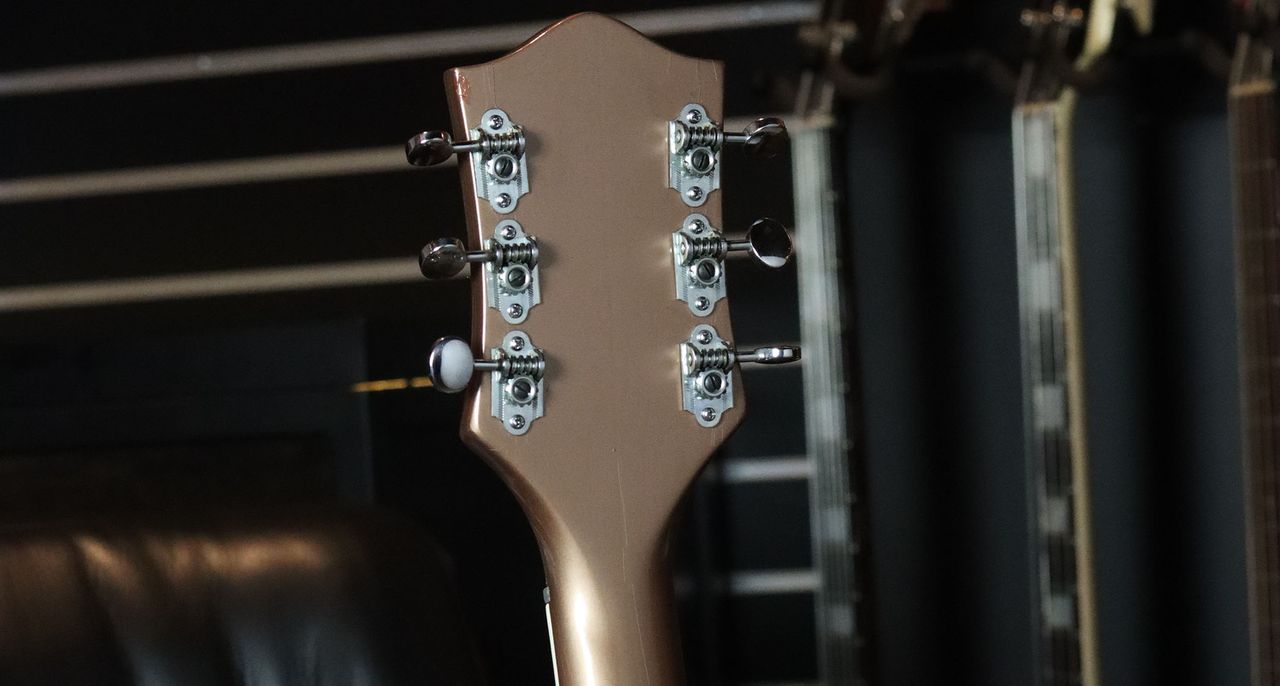 This pristine 1955 Gretsch Streamliner is finished in Jaguar Tan over Copper Mist and photographed in close-up.