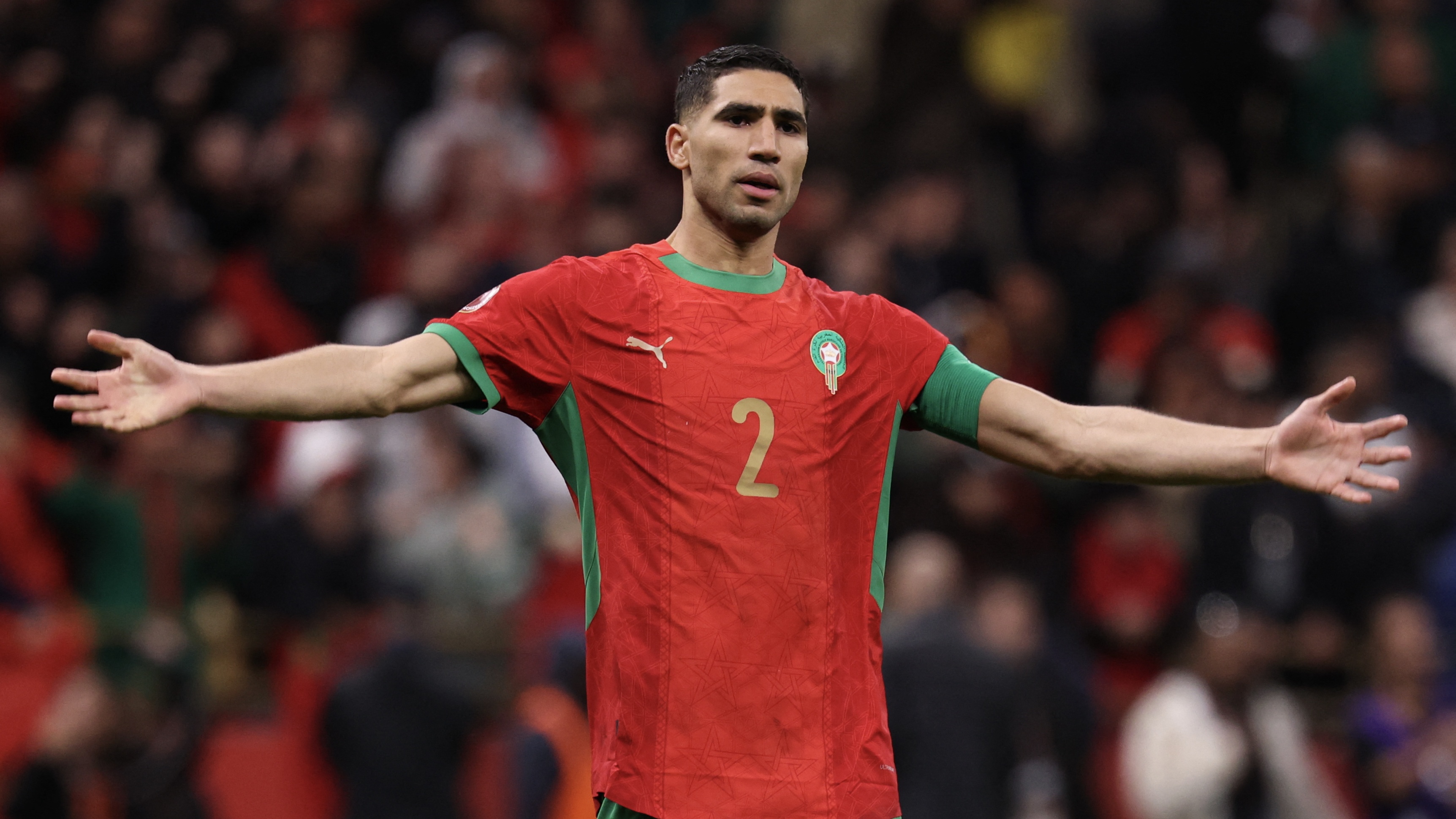 Morocco's defender #02 Achraf Hakimi celebrates after winning the Africa Cup of Nations (CAN) semi-final football match between Nigeria and Morocco at the Prince Moulay Abdellah stadium in Rabat on January 14, 2026. 