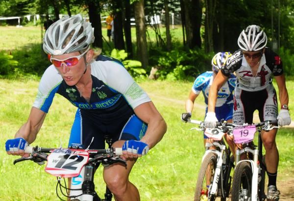 Sue Butler (River City Bicycles) riding herself on to the podium.