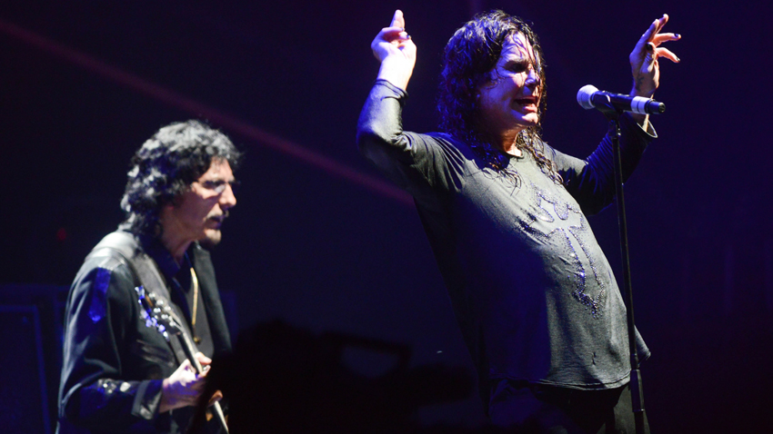 Black Sabbath&#039;s Tomy Iommi (left) and Ozzy Osbourne on stage at Lollapalooza in Chicago, August 2012.