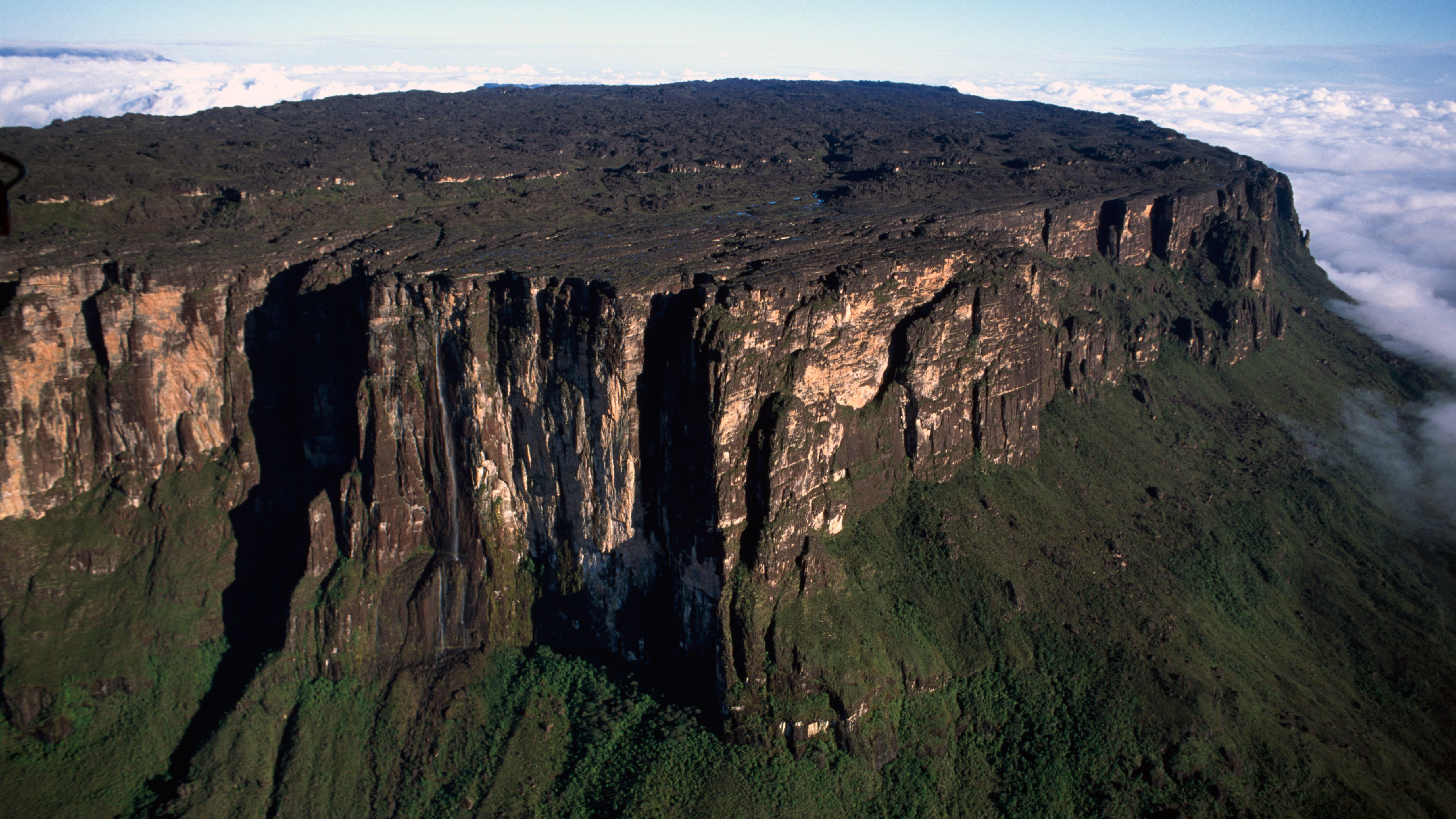 Aerial view of Mount Roraima showing the steep sides and flat top.