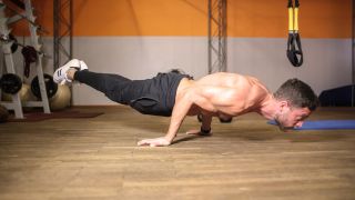 Man performs elbow lever hold