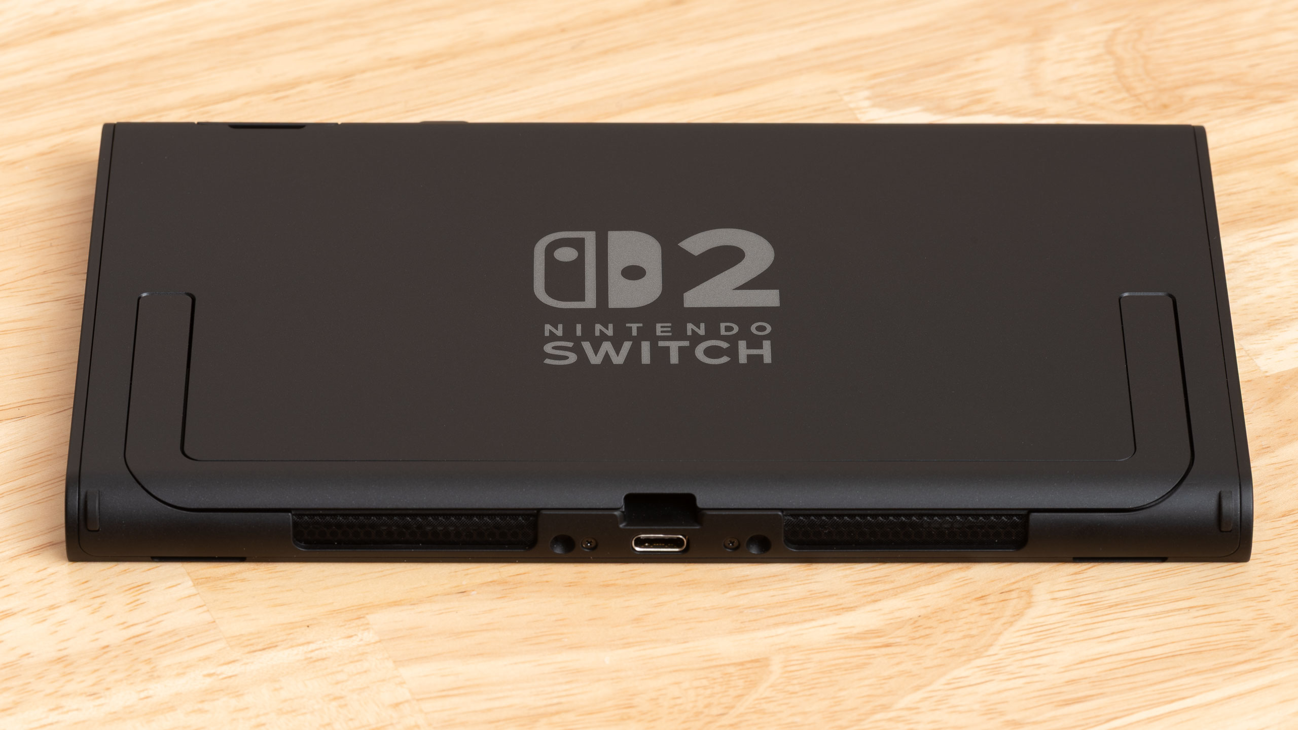 The bottom edge of a Nintendo Switch 2 console, showing its ports and speakers