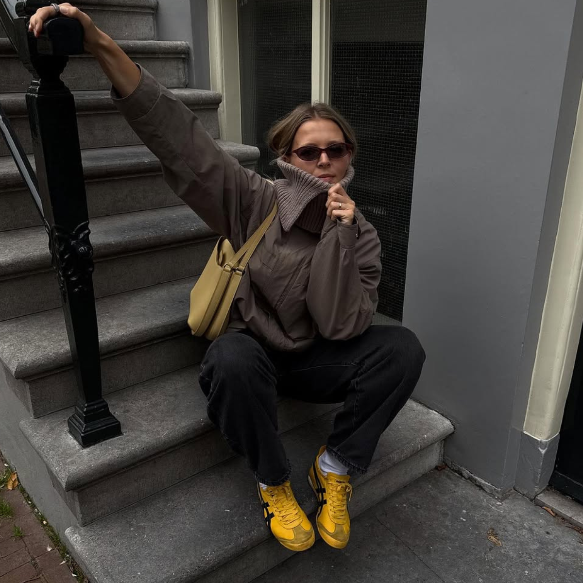 woman wearing winter sneaker outfit 2025