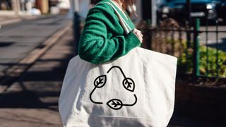 woman carrying tote bag