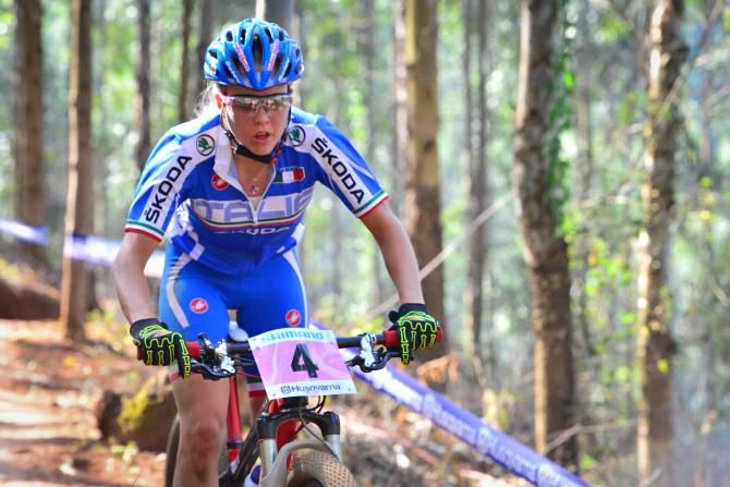 Second place Emilie Collomb of Italy works hard during her second place effort in the Junior Women's Cross Country