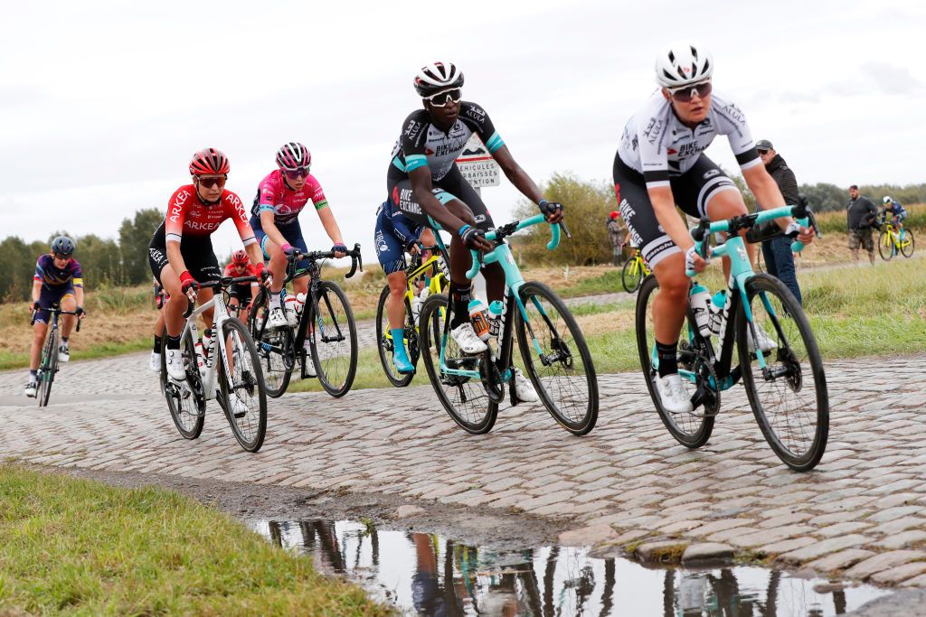 ROUBAIX FRANCE OCTOBER 02 Pauline Allin of France and Arkea Pro Cycling Team competes through Hornaing Wandignies cobblestones sector during the 1st ParisRoubaix 2021 Womens Elite a 1164km race from Denain to Roubaix ParisRoubaixFemmes ParisRoubaix on October 02 2021 in Roubaix France Photo by Bas CzerwinskiGetty Images