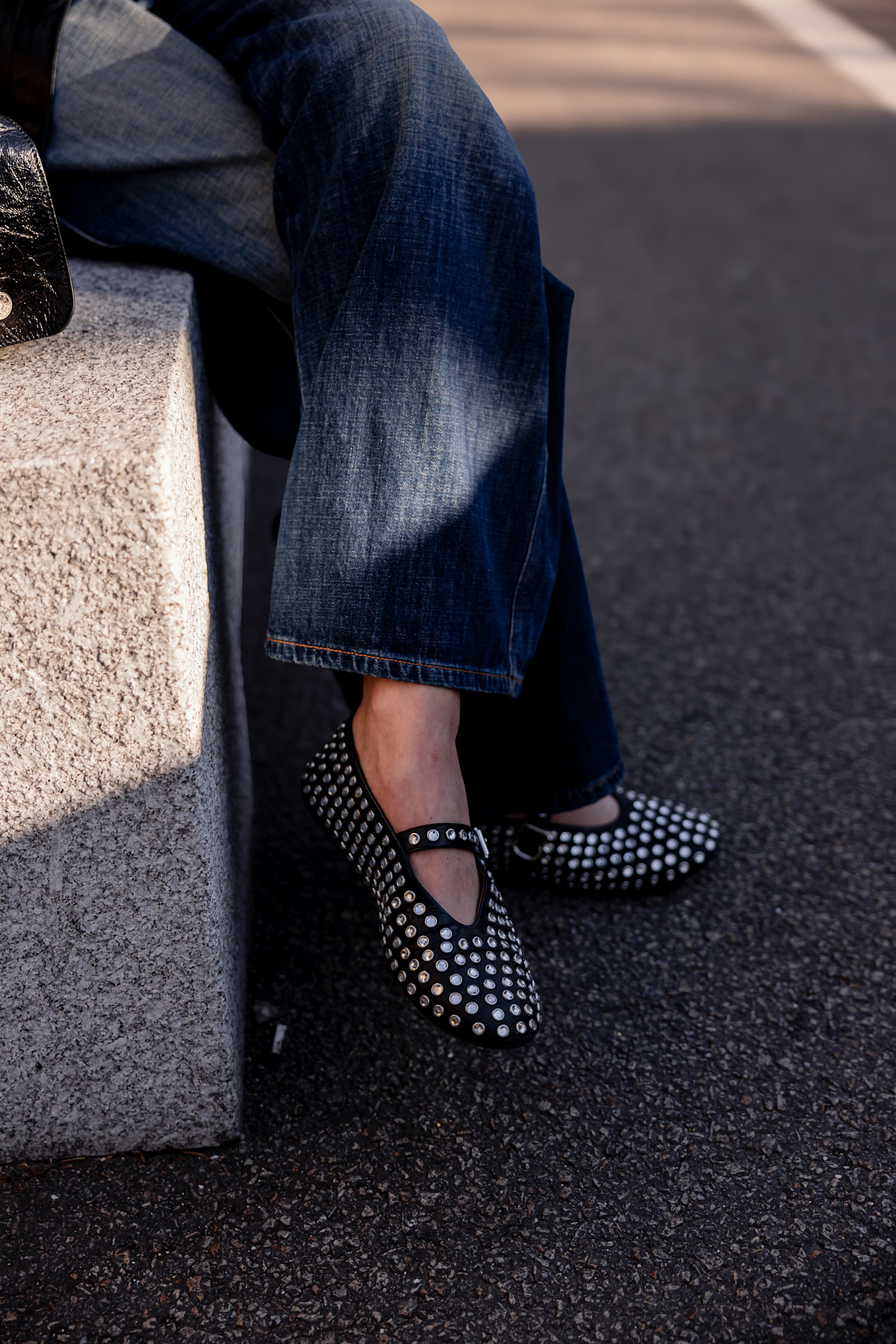 woman wearing embellished flats in Paris