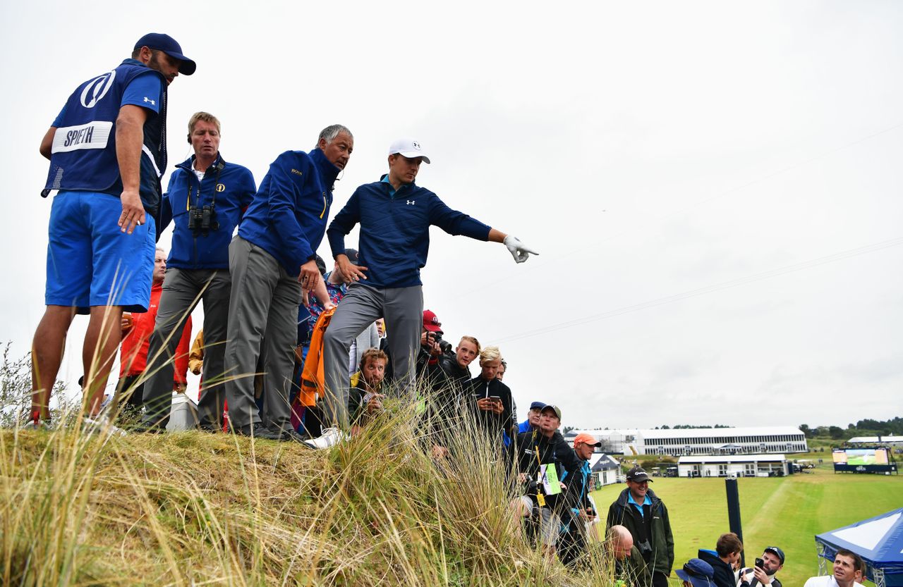 Jordan Spieth talking to a rules official over a drop at the 2017 Open