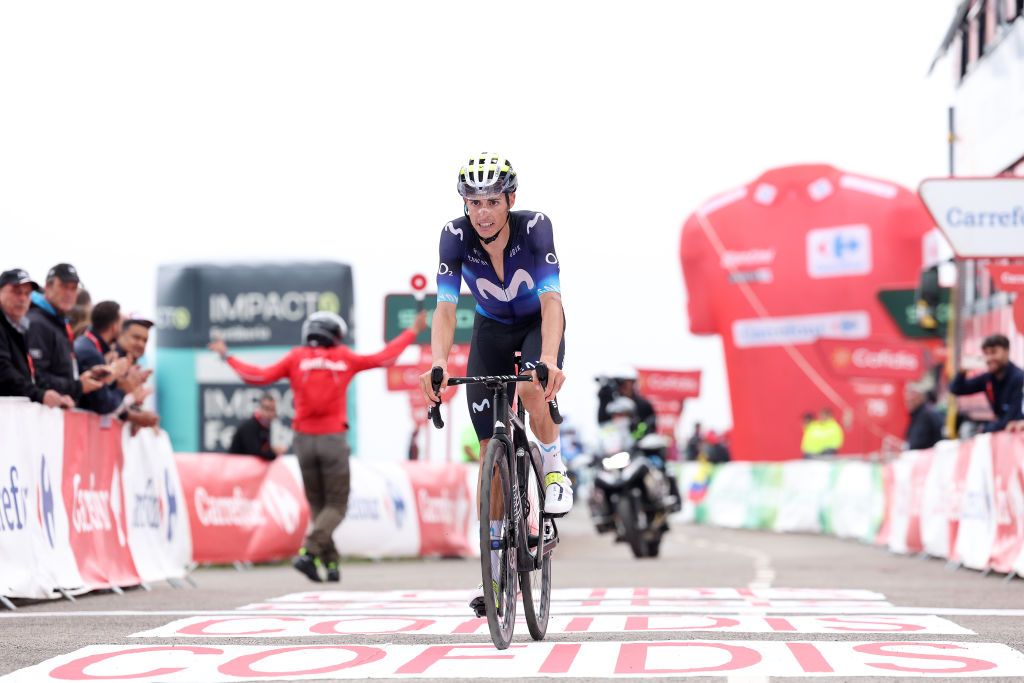 ALTU DE LANGLIRU SPAIN SEPTEMBER 13 Enric Mas of Spain and Movistar Team crosses the finish line during the 78th Tour of Spain 2023 Stage 17 a 1244km stage from Ribadesella Ribeseya to Altu de LAngliru 1555m UCIWT on September 13 2023 in Altu de LAngliru Spain Photo by Alexander HassensteinGetty Images