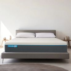 Simba hybrid mattress on a bed in a white bedroom