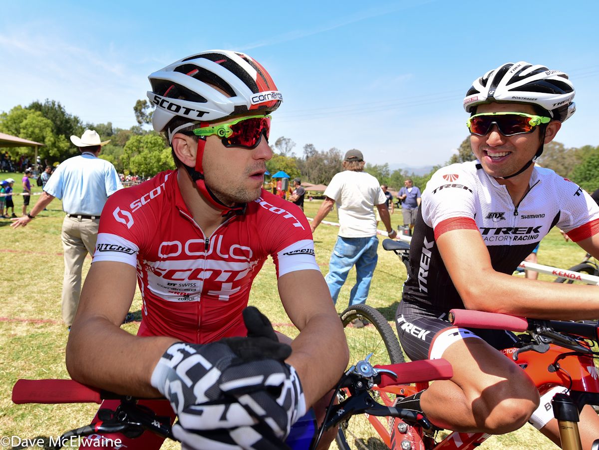 Nino Shurter (Scott) chats with Kohei Yamamoto (Trek Factory Racing) at the start