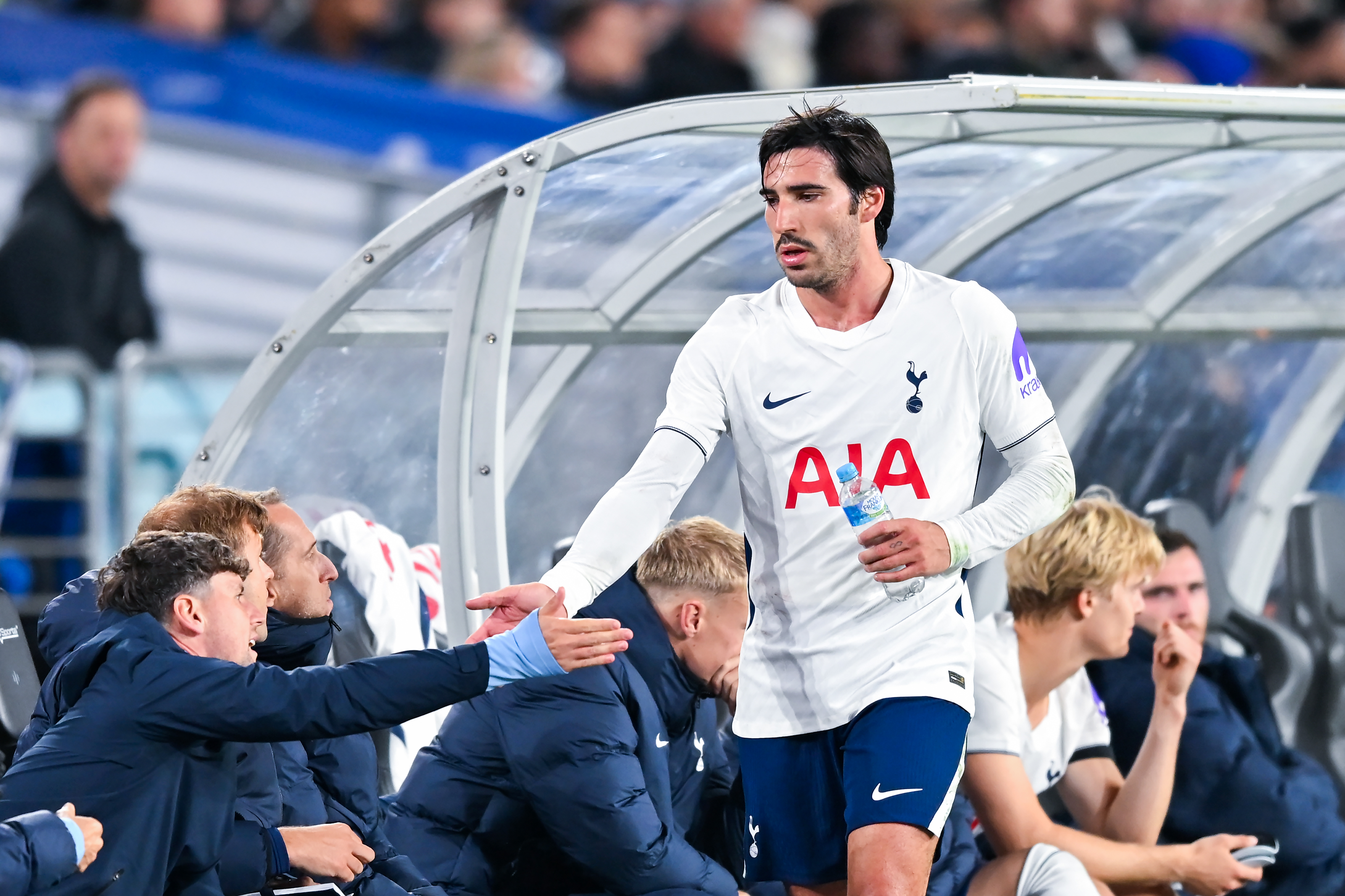 SYDNEY, AUSTRALIA - AUGUST 1: Sandro Tonali of Tottenham Hotspur shakes hands with teammates on the bench during the Sydney Super Cup match between Chelsea FC and Tottenham at Accor Stadium on August 01, 2026 in Sydney, Australia. (Photo by Ayush Kumar/Eurasia Sport Images/Getty Images)