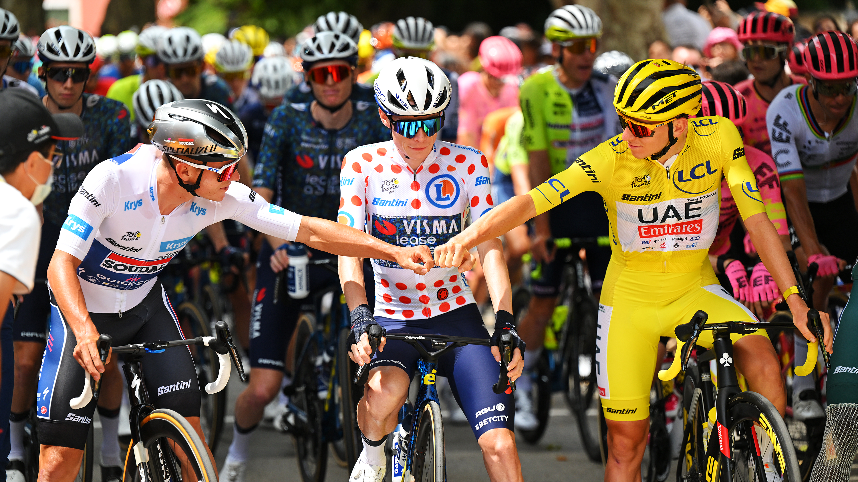 SAINT-PAUL-TROIS-CHATEAUX, FRANCE - JULY 17: (L-R) Remco Evenepoel of Belgium and Team Soudal Quick-Step - White best young jersey, Jonas Vingegaard Hansen of Denmark and Team Visma | Lease a Bike - Polka dot Mountain Jersey and Tadej Pogacar of Slovenia and UAE Team Emirates - Yellow Leader Jersey prior to the 111th Tour de France 2024, Stage 17 a 177.8km stage from Saint-Paul-Trois-Chateaux to Superdevoluy 1500m / #UCIWT / on July 17, 2024 in Saint-Paul-Trois-Chateaux, France. (Photo by Tim de Waele/Getty Images)