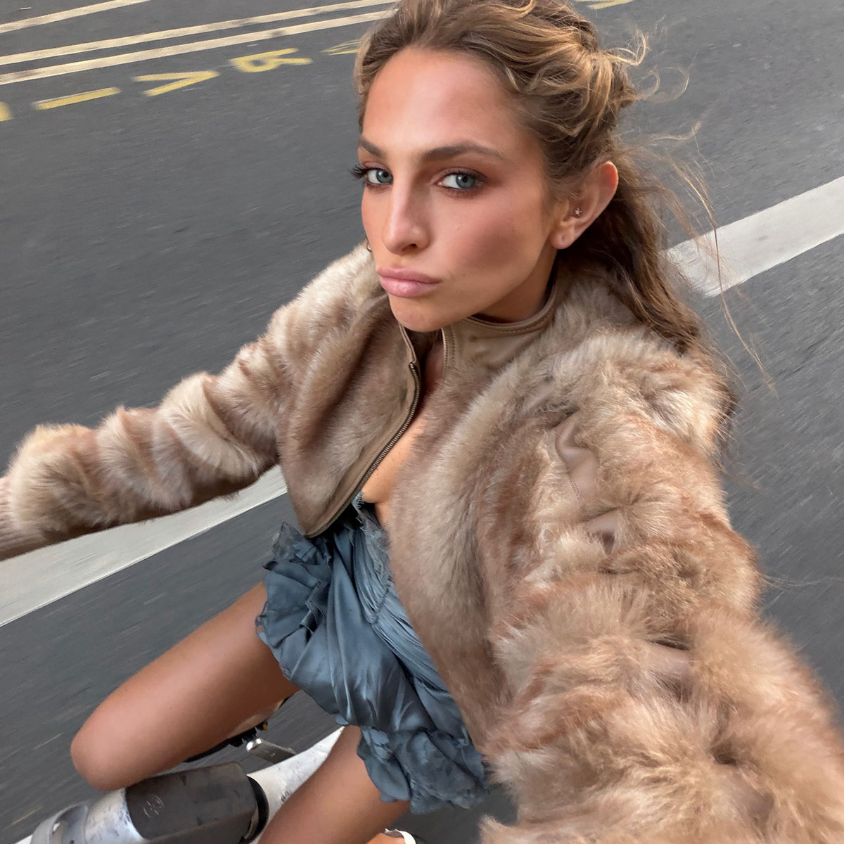 Woman in a faux-fur jacket