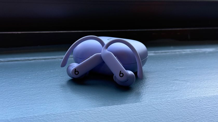 Powerbeats Pro 2 in Hyper Lilac in front of case