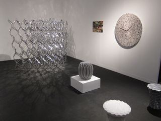 'Silver Link Sculpture', 'Kaleidescope Stool', 'Money Clock' and 'Hex Side Table' by Michael Young