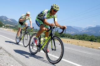 Stefano Feltrin paces Tinkoff-Saxo team boss Oleg Tinkov as they ride in France on Monday.