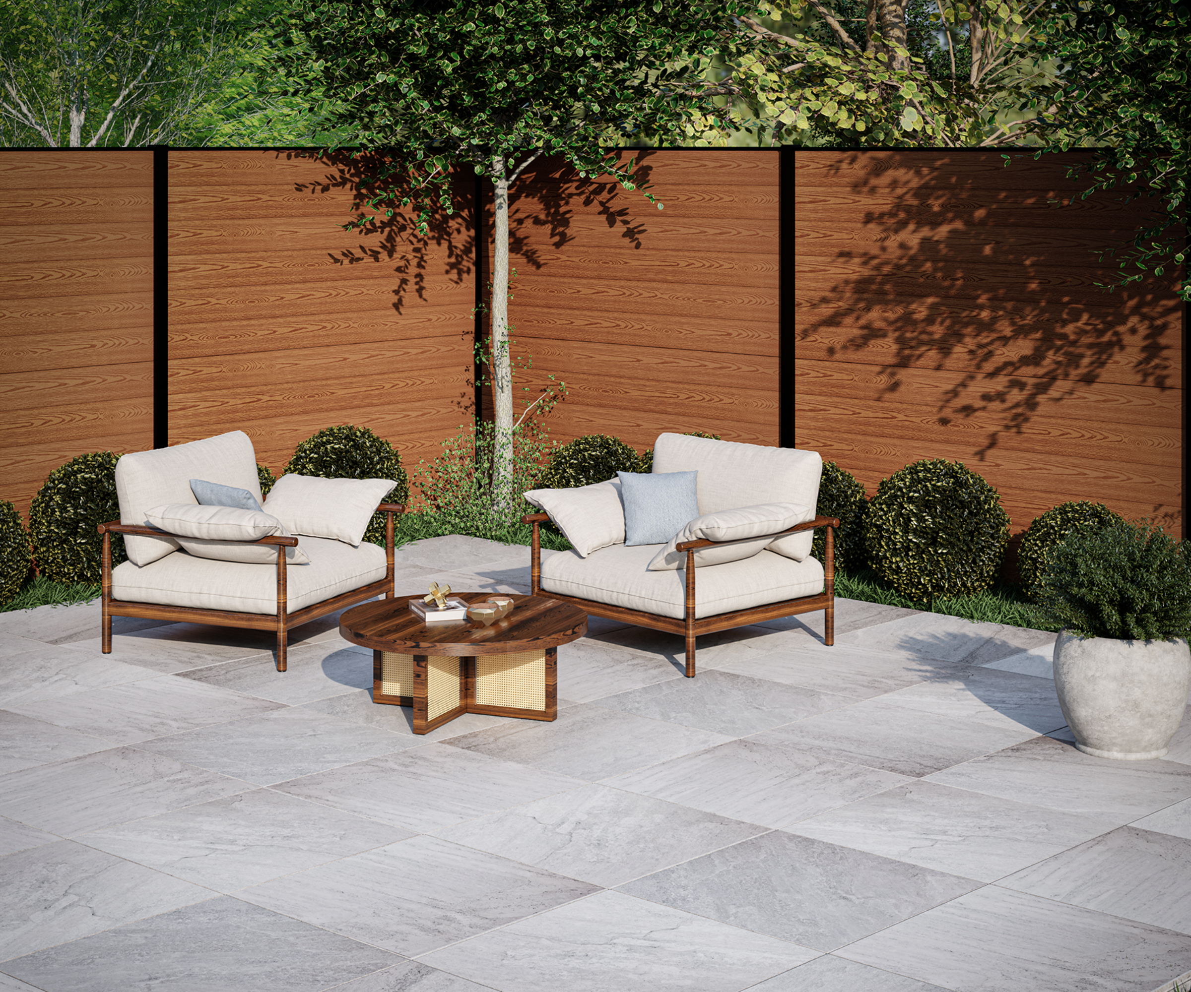 oak coloured composite fence panels surrounding patio area with light grey slabs and seating