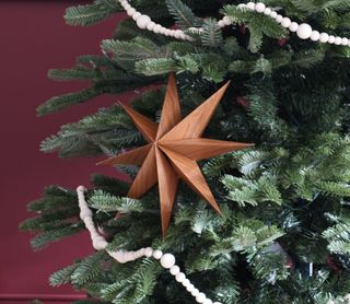 close up of a star on a christmas tree