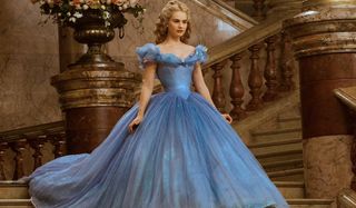 Cinderella Lily James walks down the stairs in her dress
