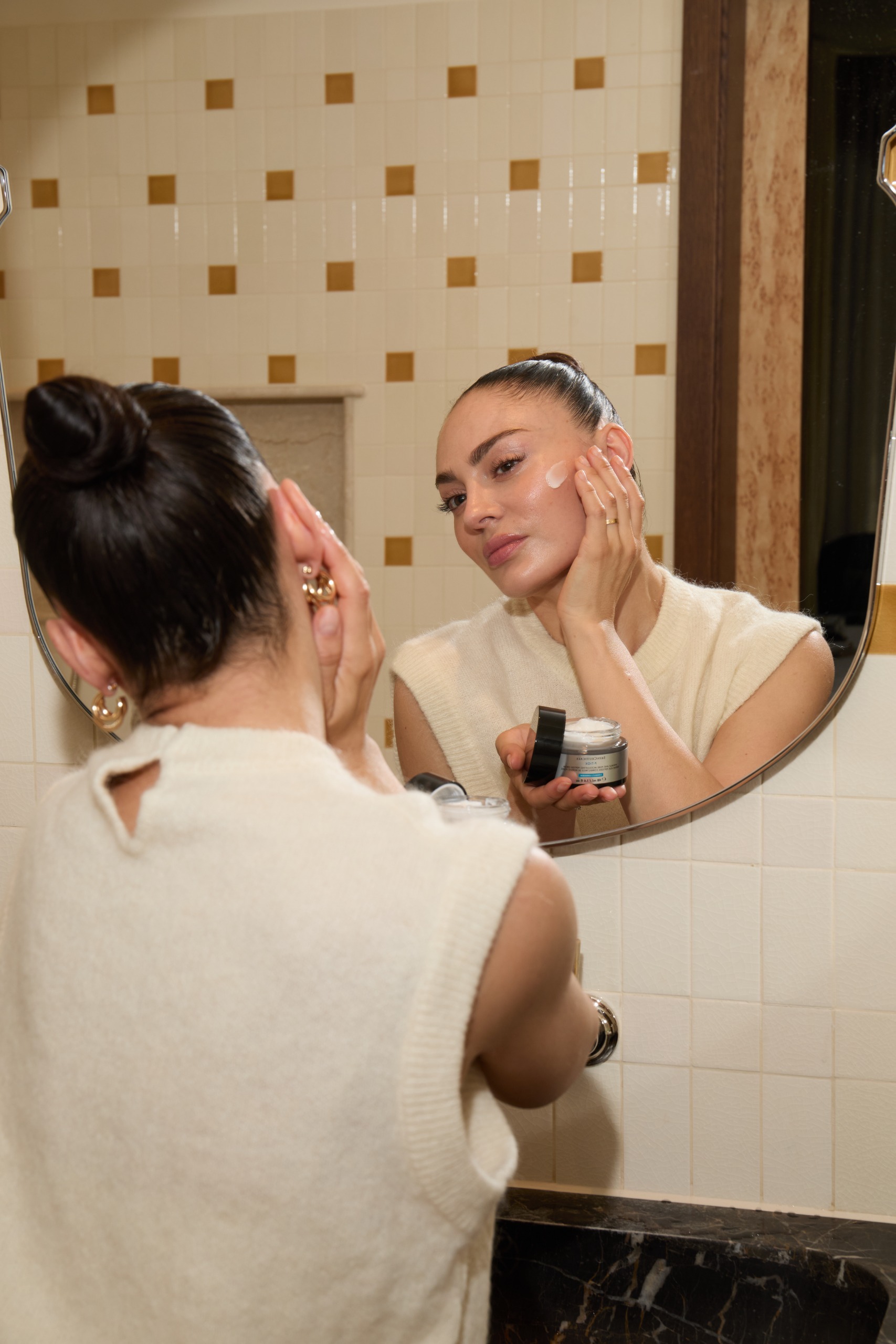 Eleanor Hartley applying Skinceuticals PTiox Cream
