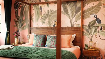 Pink palm tree wallpaper with wooden bed