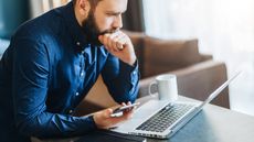 Laptop user looking worried