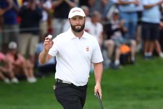 Jon Rahm waves to the crowd