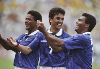 Bebeto performs his famous rocking baby celebration alongside Mazinho and Romario after scoring for Brazil against the Netherlands at the 1994 World Cup.