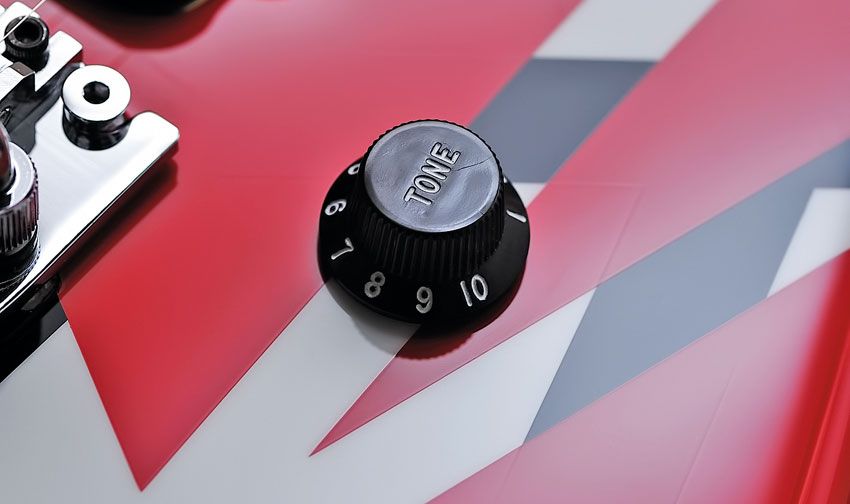 It says 'tone', but it's a volume knob - an Eddie-ism that stuck