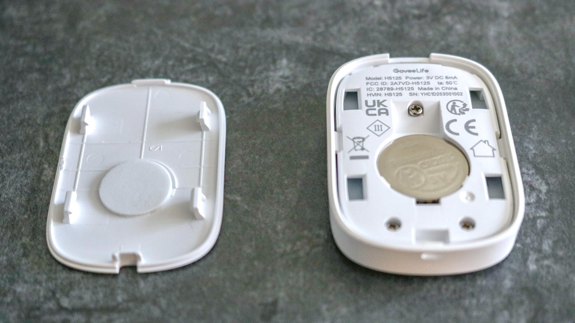 The battery inside of the Govee Smart Button Sensor